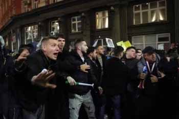 Thousands protest in Bulgaria before budget with steep tax increases gets final approval