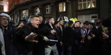 Thousands protest in Bulgaria before budget with steep tax increases gets final approval