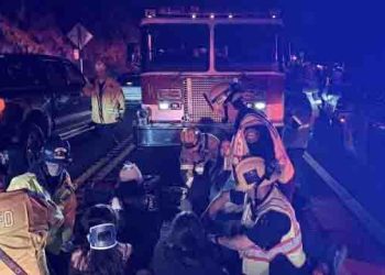 Bus returning from church camp overturns on winding California road, 20 injured