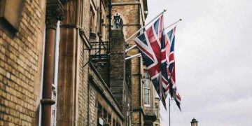 UK may face 11 billion pounds hit from new legal immigration curbs