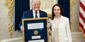 Venezuelan Nobel Peace Prize winner presents her medal to Trump