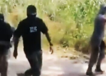 Greek police using masked migrants to forcibly push other migrants back across border