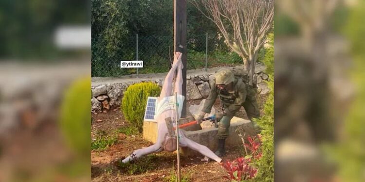 Israeli Army Probes Image Of Soldier Hitting Jesus Statue In Lebanon