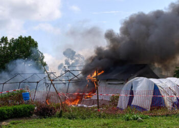 Protesters set Ebola treatment center on fire in DRC, demanding return of body