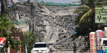 Dozens feared trapped after nine-storey building collapses in the Philippines