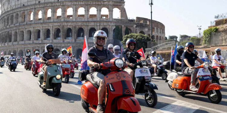10,000 Vespas Swarm Rome’s Historic Sites To Mark Scooter’s 80th Anniversary