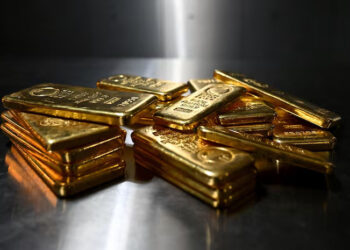 Gold climbs as weaker dollar, easing inflation lift bullion prices