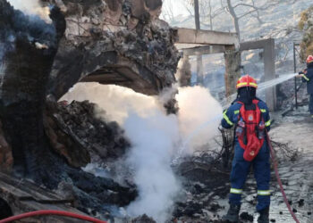 Two dead and hundreds evacuated after twin fires break out on Greek island