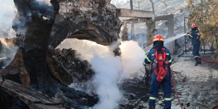 Two dead and hundreds evacuated after twin fires break out on Greek island