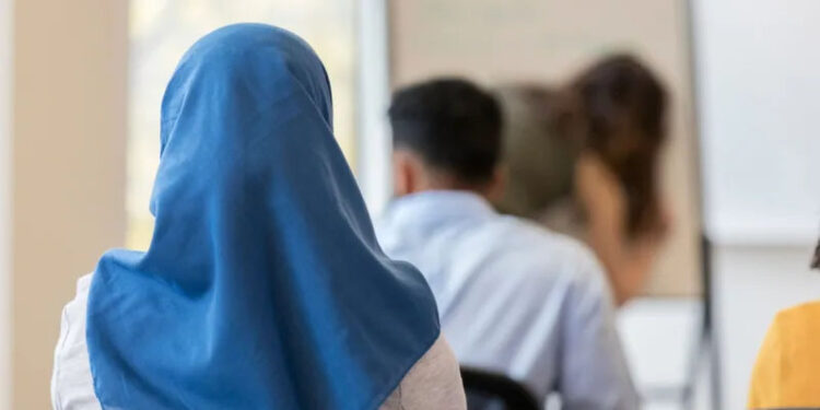 Austria’s Islamic headscarf ban in force as under-14s go back to school