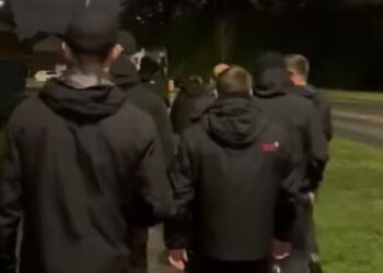 Go home: Dressed in all black, UK vigilantes bar Indian students from park 5 Go home: Dressed in all black, UK vigilantes bar Indian students from park