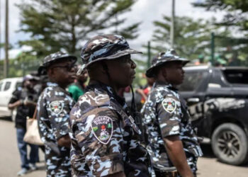 Gunmen kill at least 10 villagers and loot shops in northeast Nigeria